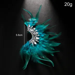 Exotische Ohrklemme mit bunten Federn und Strass im extravaganten Boho Stil Ohrring