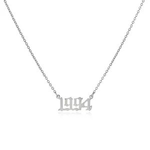 Stainless steel 1994 year number pendant necklace, gothic style fashion jewelry detail shot.