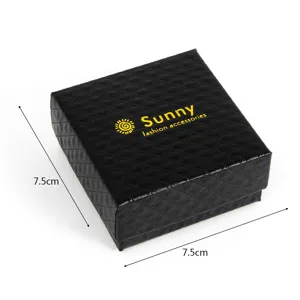 Black quilted jewelry box with gold logo, square gift box for rings, earrings and necklaces.