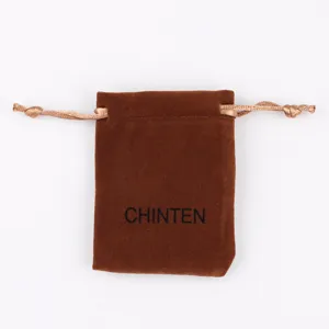 Brown velvet jewelry pouch detail showing soft texture and convenient drawstring closure.