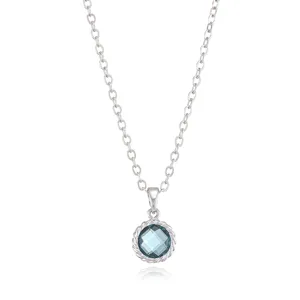 Close-up detailed view of silver-tone cable necklace with a blue gemstone pendant.