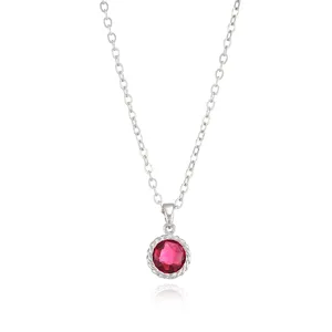 Detailed closeup view of the exquisite red gemstone pendant and delicate silver chain links.