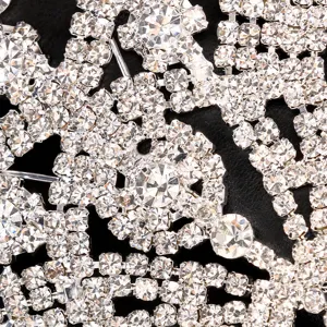 Exquisite rhinestone face mask detail featuring sparkling crystal chains for fashion party.