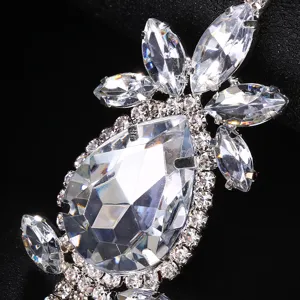 Close-up detail of luxury crystal rhinestone masquerade party mask accessory sparkling.