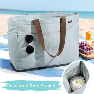 Close-up detail of the large capacity beach tote bag featuring an insulated side pocket and durable fabric.