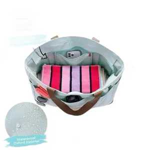 Large capacity waterproof beach tote bag for women, portable travel shoulder bag with pockets.