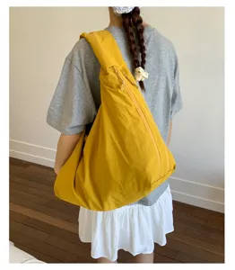 Casual yellow canvas shoulder bag for women, large capacity slouchy hobo tote bag daily.