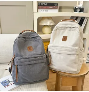 Zaino vintage in velluto a coste da donna, grande capacità borsa scolastica casual per laptop.