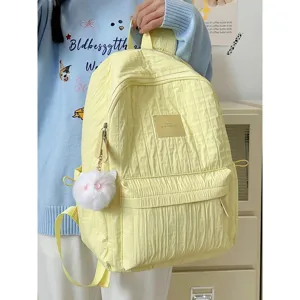 Beau sac à dos d'école minimaliste pour fille, cartable décontracté de couleur unie.