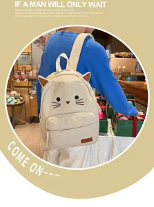Cute cat corduroy backpack detail view, featuring adorable cat ears and whiskers for daily school use.