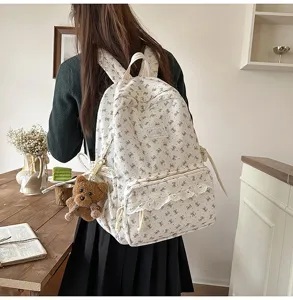 Korean style cute corduroy backpack with bowknot and lace trim, perfect for students.
