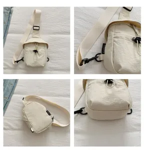 Detail view of casual outdoor lightweight crossbody chest bag, showing strap, buckle and tag.