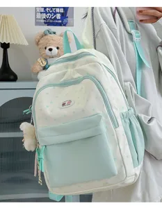 Cute contrast color school backpack with star pattern and front pocket for daily use.