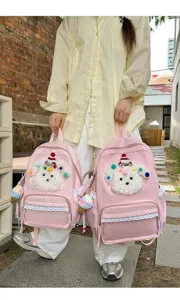 Sac à dos rose mignon motif chiot dessin animé pour filles avec bordure en dentelle et poche.