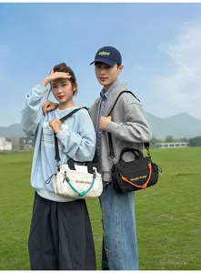 Casual canvas shoulder bag outdoor commuting handbag detailed view showcasing stylish strap.