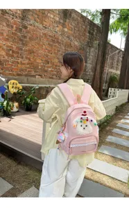Joli sac à dos cartable chiot dessin animé pour filles, rose avec dentelle vue détaillée.