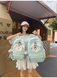 Sac à dos vert menthe mignon avec peluche chiot duveteuse et dentelle pour filles.