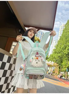 Sac à dos d'école chiot de dessin animé mignon avec dentelle et poche transparente.