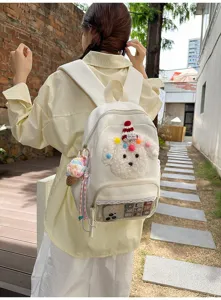 Joli sac a dos scolaire pour fille avec chien pelucheux et poche transparente elegante.