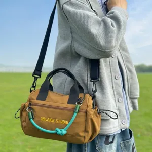 Multi-functional outdoor casual crossbody bag large capacity nylon travel shoulder handbag for daily commute.