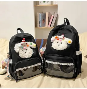 Joli sac à dos pour chiot de dessin animé avec bordure en dentelle et poche avant transparente.
