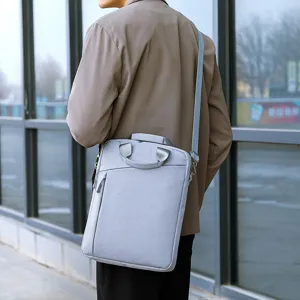 Sac bandoulière gris minimaliste, mallette professionnelle imperméable en tissu oxford.