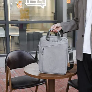 Sacoche ordinateur portable en tissu oxford gris business casual sac à bandoulière pratique.