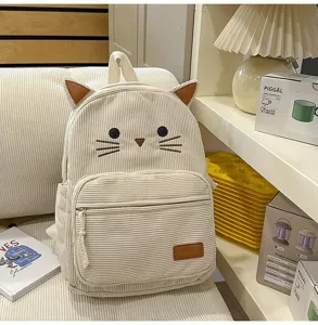 Cute cat corduroy backpack for daily school and casual wear with embroidered details and pockets.