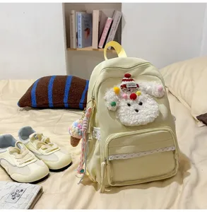 Sac à dos scolaire décontracté jaune avec bordure en dentelle et design de chiot mignon.