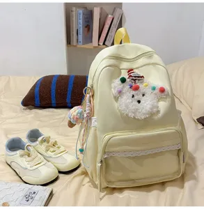 Sac à dos mignon pour chiot de dessin animé avec poche avant transparente et dentelle.