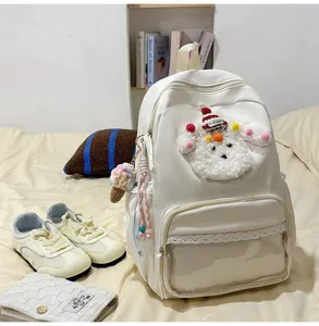 Sac à dos mignon chien dessin animé pour étudiants grande capacité blanc avec bordure en dentelle.
