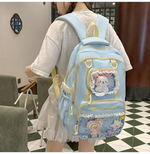Cute light blue school backpack with transparent ita window, lace trim and large capacity.