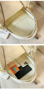 Korean style striped school backpack internal compartment detail showing storage capacity.