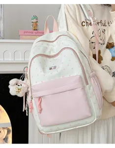 Cute contrast color women backpack with pink stars and front pocket for school students daily use.