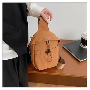 Casual outdoor nylon chest bag for men and women, lightweight crossbody shoulder backpack.