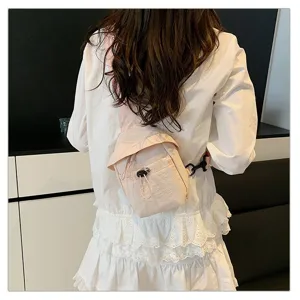 Detail view of lightweight pink chest bag with drawstring for outdoor travel and sports.