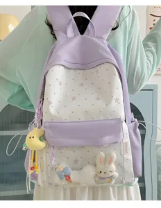 Japanischer süßer lila Rucksack mit klarem Sichtfenster, Sternenmuster und niedlichen Plüschtieren.