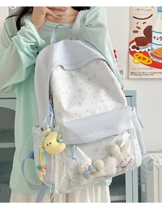 Süßer japanischer Ita-Rucksack mit transparentem Frontfach und niedlichen Plüschtier-Anhängern für den Alltag.
