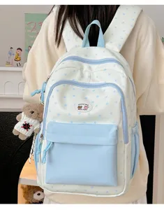 Cute color block star backpack for women and students. Fresh casual school bag with cute bear pendant.