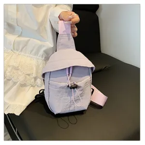 Detailed view of outdoor light purple chest sling bag featuring pink straps and adjustable drawstring.