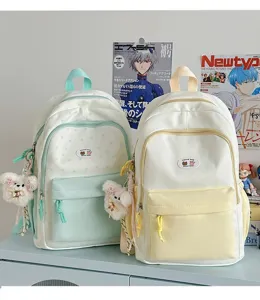 Cute star pattern colorblock backpack, fresh style school bag for teen girls and students.