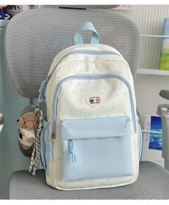 Cute color block backpack featuring adorable star patterns and front pocket, ideal for daily school.