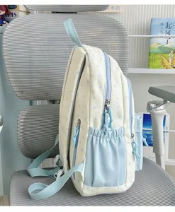 Cute pastel blue and off-white star pattern backpack for daily school and casual use.