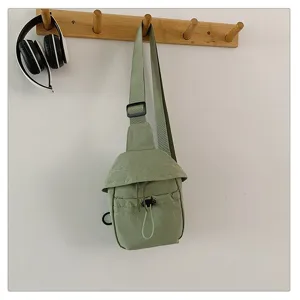 Casual outdoor lightweight crossbody chest bag in sage green, perfect for daily travel and sport.
