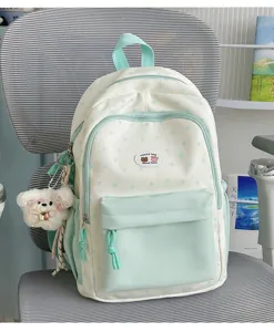Cute mint green and white canvas backpack with stars pattern for school students daily use