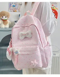 Sac à dos rose à pois avec charms en peluche, joli cartable japonais pour filles et ados.