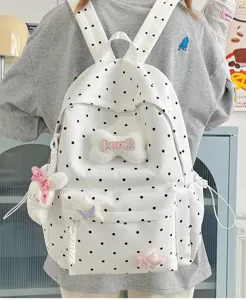 Sac à dos à pois mignon style japonais pour femme, cartable décontracté avec pendentifs en peluche.