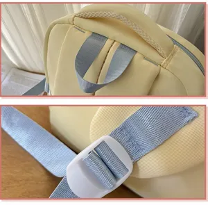 Backpack detail view showing durable fabric, reinforced straps and adjustable plastic buckle.