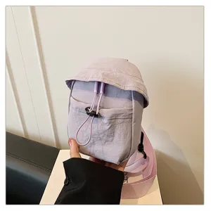 Small outdoor crossbody chest bag in light purple, casual minimalist style for daily sports.