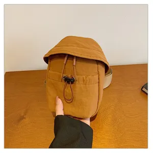 Casual outdoor small crossbody chest bag, brown lightweight fabric, ideal for daily sports.
